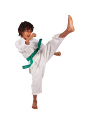 Mixed race child in a white martial arts gi and green belt performing a karate punch © poco_bw