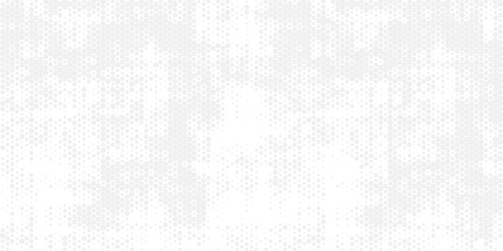 Dynamic gray halftone dot pattern creates lively abstract background with energetic visual impact.