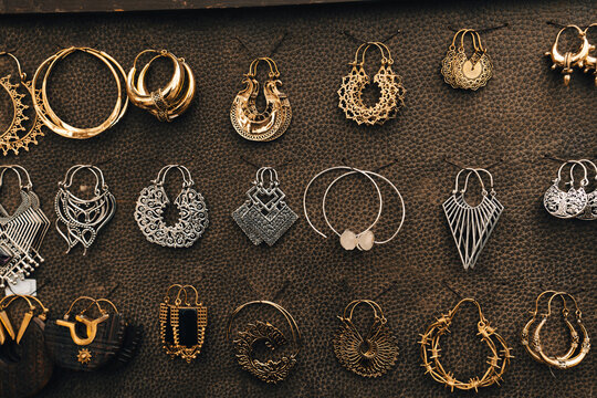 Decorative earrings displayed at festival market stall in Berlin