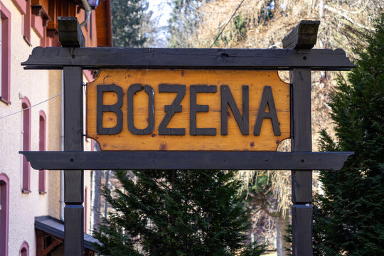 Szklarska Poreba, Poland - December 18, 2025: bozena carved into a rustic wooden sign, offering a charming identity for a unique destination or local business