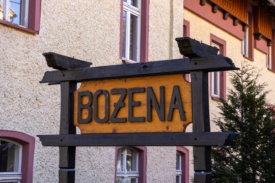 Szklarska Poreba, Poland - December 18, 2025: Bozena name on a rustic wooden sign, identifying a historical building with traditional architecture and old-world charm
