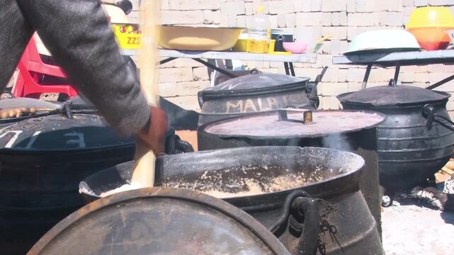 Traditional Setswana Communal Cooking in a Village Compound, Preparation of Bogobe and Pap