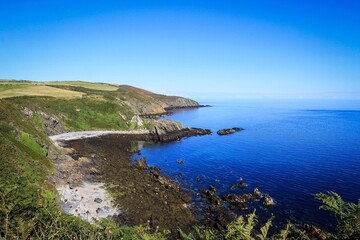 Obraz premium Marine Drive bright landscape near Port Soderick by sunny noon, Isle of Man