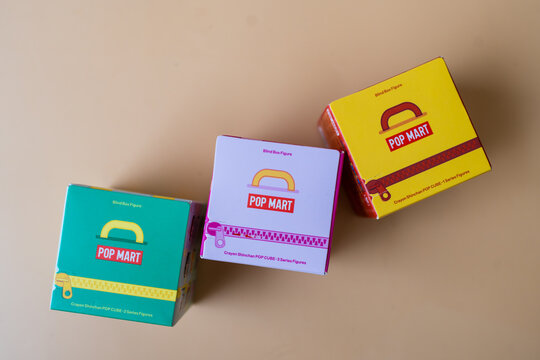 Bangkok, Thailand - April 14, 2026 : Crayon Shinchan POP CUBE 3,2 and 3 Series Figures. Blind Box from Popmart shop