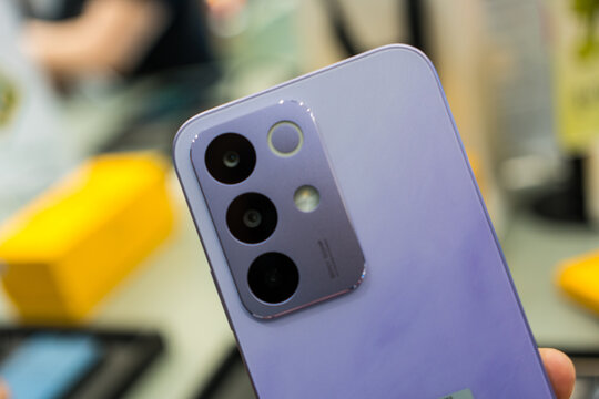 Bangkok, Thailand - April 14, 2026 : Parrot Purple smartphone of Realme C85 5G. New smartphone of Realme C85 5G. Size 6.8 inches.