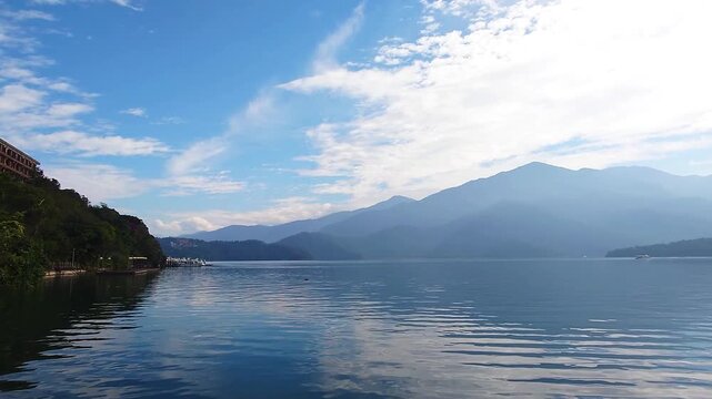 Sun Moon Lake Scenic View with Mountain Silhouette and Blue Sky in Taiwan