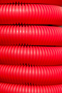 Red corrugated tube pattern background