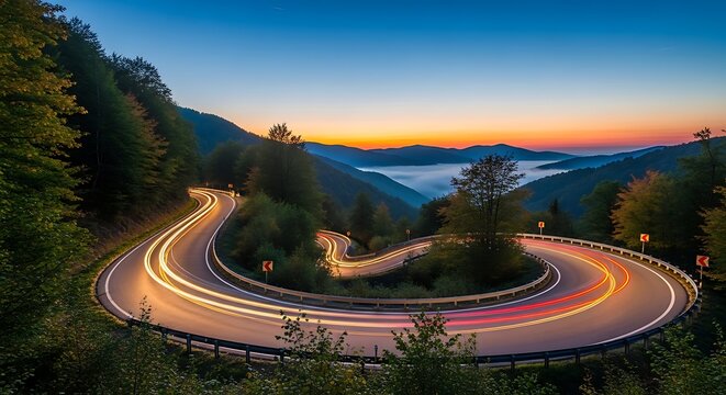 Winding Road at Dusk - A Scenic Mountain Drive.