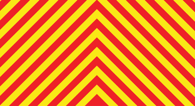 Industrial safety warning stripes with red and yellow chevron pattern
