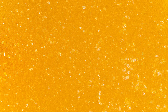 Texture of yellow lemon marmalade with sugar closeup
