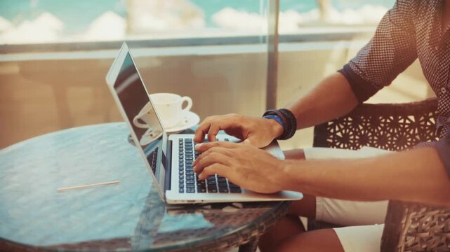 Manager Typing On Laptop Keyboard At Outdoor Cafe Table. Remote Job And Career Flexibility. Coffee Break
