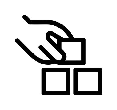 Hand is shown placing a small square block into a slot in a vector illustration