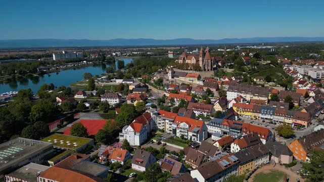 An aerial panorama view beside the old town of the city Breisach in Germany on a sunny summer day. 
