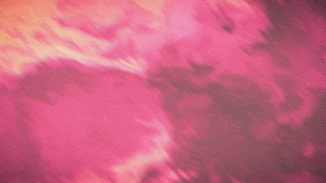 Vibrant pink and orange hues create a mesmerizing abstract background on a textured surface 