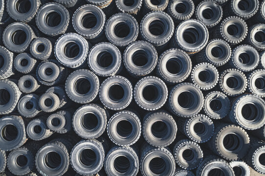 Aerial view of a large collection of used black rubber tires stacked in a dense pile Santa Lucia de Gordon, Castile and Leon, Spain.