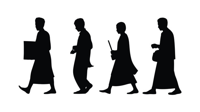 Silhouettes of four monks walking in traditional robes a peaceful procession