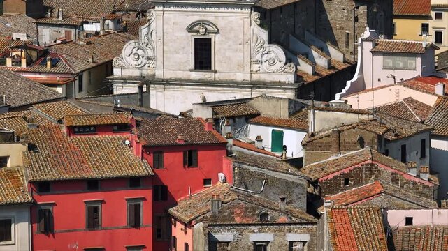 Orte aerial viewy medieval town volcanic rock. Italy travel destination historic buildings red rooftops scenic mountain background high angle drone view professional quality.
