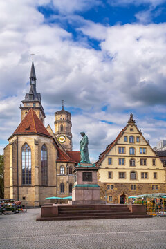 View of Schillerplatz square with Schiller monument in Stuttgart, Germany. Historical city center under cloudy sky and clouds