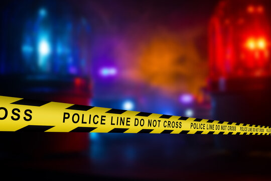 a small set of police yellow ribbons with the text prohibiting passage