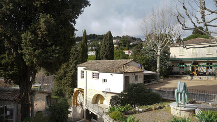 Traditional old stone houses on a street in the medieval town of Saint Paul de Vence, French Riviera, South of France
