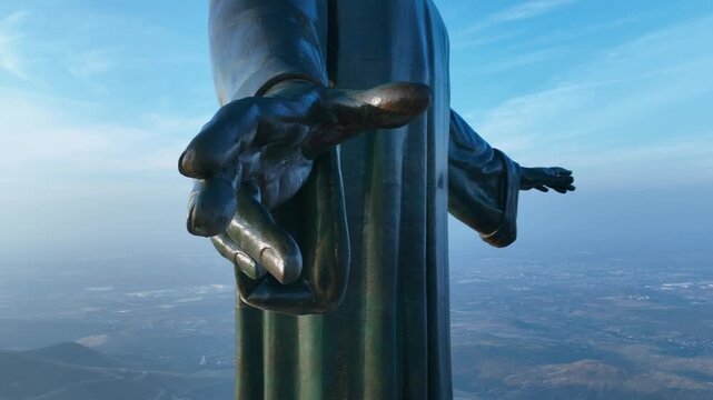 Filming with a drone, a huge Catholic image is seen on a mountain in Mexico where all the mountains can be seen