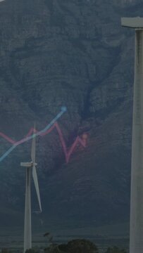 Vertical video: Neon lines emerging from left tracing turbine across mountain showing wind power
