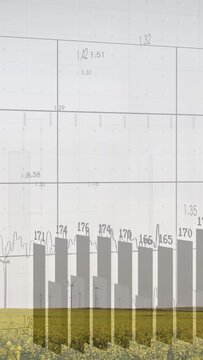 Vertical video: Data overlay growing over turbine with frames advancing grid and bars showing power