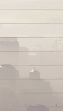 Vertical video: Market data sparking chart overlay rising, V-drop, recovering over hazy skyline