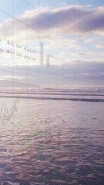 Vertical video: Shoreline showing tide advancing and camera panning, displaying tech chart overlay