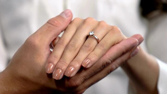 Romantic shot of a Boy and girl holding hands. first love. close-up. slow motion video. High quality HD video. Life partner and marriage proposal concept 