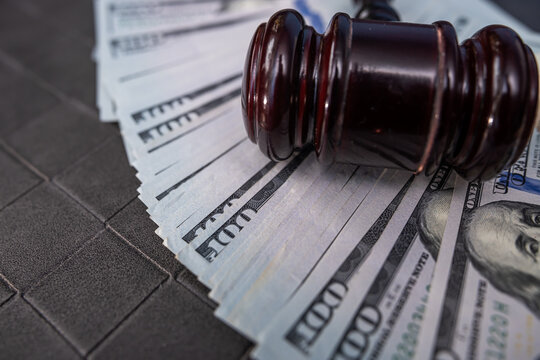 Legal Authority Concept With Judge Hammer On Dollar Banknotes Finance And Regulation