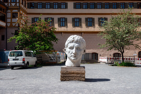 Tubingen, Germany- May 10, 2025: Augustus Head marble statue sculpture in University of T&uuml;bingen Museum courtyard at Hohent&uuml;bingen Castle