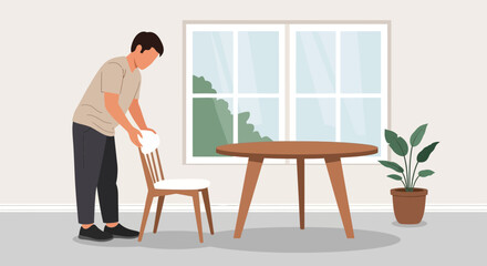 Fototapeta premium Man tidying up a dining room, placing a chair at a wooden table near a window.