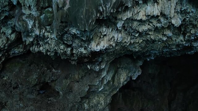 Turkiye, Belek, 27.07.2025 Damlatas cave walls with stalactites in Turkey. Geological formations inside mysterious grotto. Vacation travel destination for exploration and nature adventure.