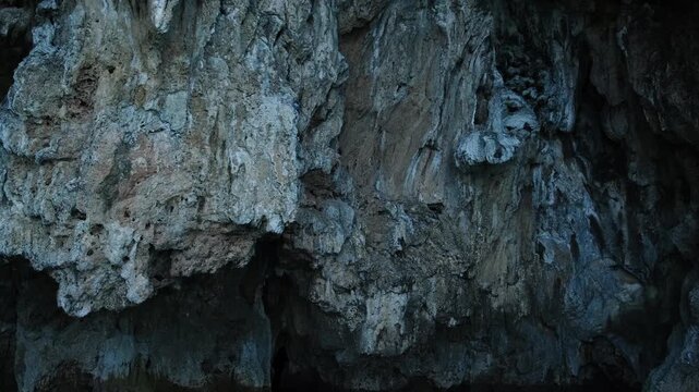 Turkiye, Belek, 27.07.2025 Huge stone wall of sea cave in Turkey. Geological rock formation inside an ancient grotto. Natural landscape for adventure travel, holiday sightseeing excursion.