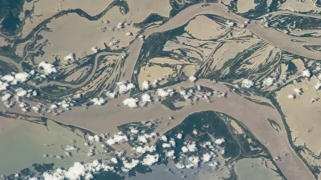 Aerial Amazon Floodplain Brazil Meandering River Channels Sediment Texture Natural Landscape Elements of this video furnished by NASA