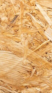 Oriented Strand Board OSB Texture Background Natural Wood Chip Pattern Construction Material Detailed Timber Surface Abstract Brown Wooden Panel