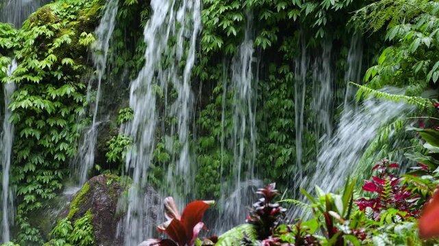 Serene Rural Landscape. Gentle Waters Nurture Lush Surroundings. Flowing Cascades Amid Greenery Create Tranquility. Waterfalls Cascade Over Mossy Terraces Within Rural Scenery