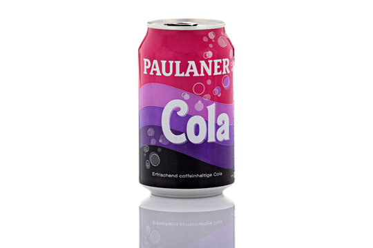 Paulaner Cola caffeinated soft drink aluminum can isolated on white background. German soda beverage packaging photographed as illustrative editorial content.