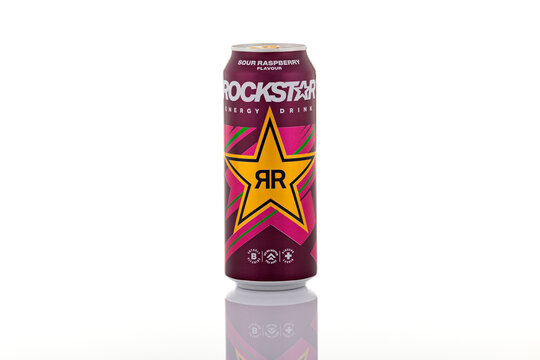 Rockstar Energy Drink sour raspberry flavour aluminum can isolated on white background. Branded caffeinated beverage shown as illustrative editorial content.
