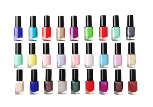 Collection of various colorful nail polish bottles isolated on transparent background