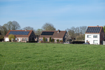 Obraz premium Residential houses with solar panels in rural Geel