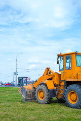 Backhoe excavator and bulldozer on construction site © Krystsina