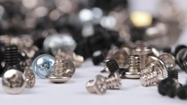 Metal screws for fastening equipment. Soft focus. Close-up. 