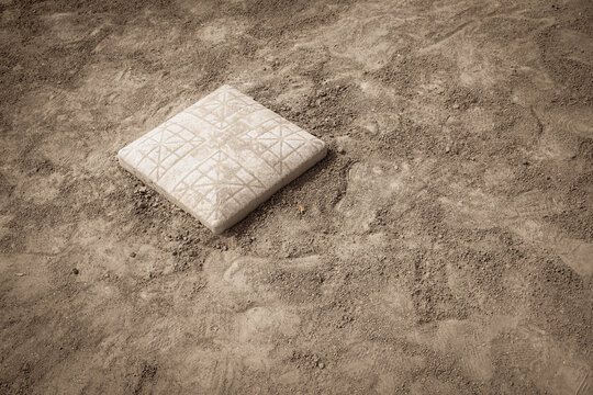 Second base on dirt baseball and softball field