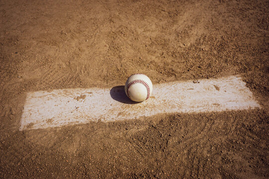 Baseball on pitcher's mound and infield dirt