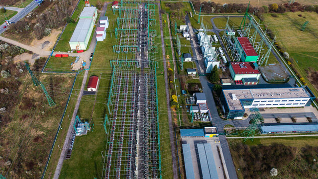 Aerial view of a power station with a complex network of high-voltage lines stretching across the landscape, Praha-Seberov, Hlavni mesto Praha, Czechia.
