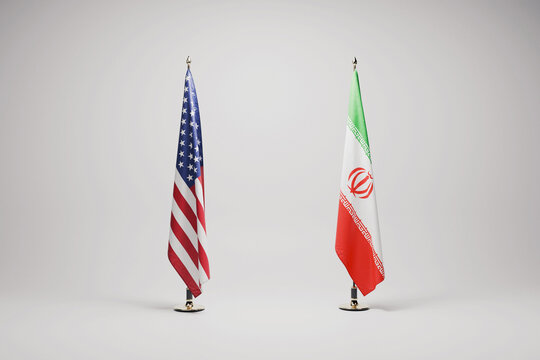 national flags of the United States and Iran stand side-by-side on indoor poles. stark visual representing geopolitical tensions, diplomatic standoffs, and the escalating conflict in the Middle East.
