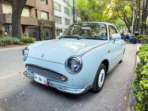 Mexico City, Mexico - March 29, 2024. Light blue Nissan Figaro