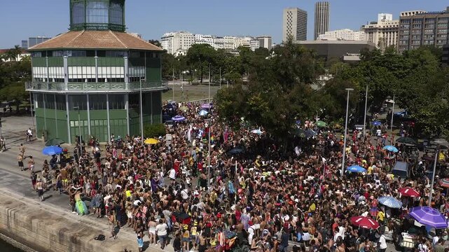 Aerial View, Drone Footage of big and crowded carnival block parade in downtown Rio de Janeiro in Brazil. 